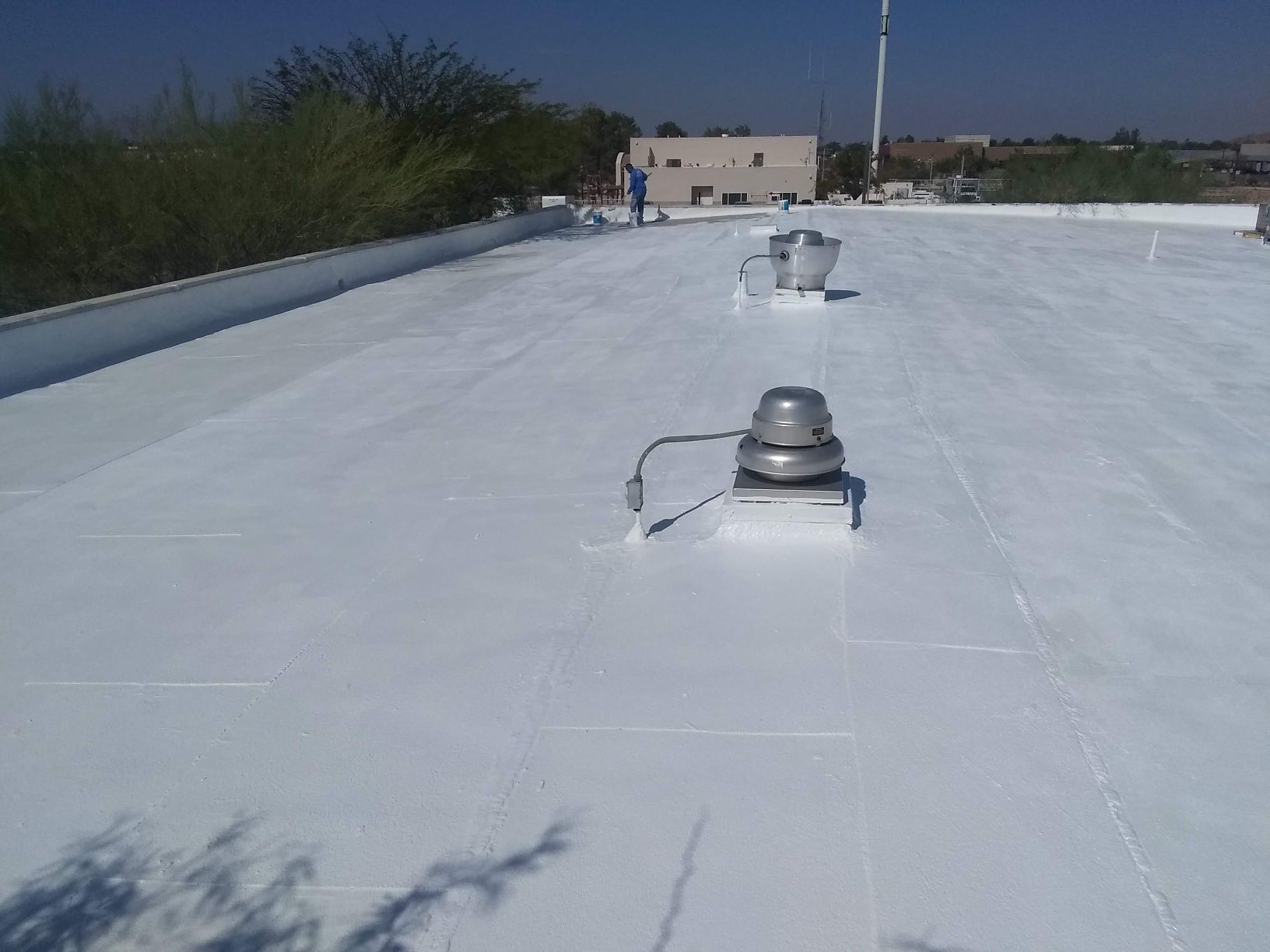 Commercial roof repaired by All Improved Roofing